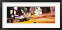 Framed Yellow taxi on the road, Times Square, Manhattan, New York City, New York State, USA