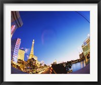 Framed Buildings lit up at dusk, Las Vegas, Nevada