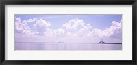 Framed Sea with a container ship and a suspension bridge in distant, Sunshine Skyway Bridge, Tampa Bay, Gulf of Mexico, Florida, USA