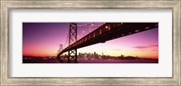 Framed Bay Bridge and city skyline at night, San Francisco, California, USA
