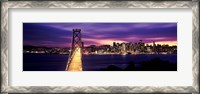 Framed Bridge lit up at dusk, Bay Bridge, San Francisco Bay, San Francisco, California