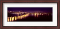 Framed Bridge lit up at night, Bay Bridge, San Francisco Bay, San Francisco, California