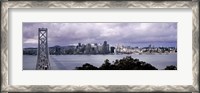 Framed Bridge across a bay with city skyline in the background, Bay Bridge, San Francisco Bay, San Francisco, California, USA
