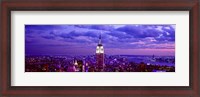 Framed Empire State Building lit up in white, Midtown Manhattan, New York City