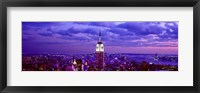 Framed Empire State Building lit up in white, Midtown Manhattan, New York City