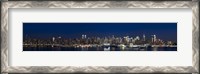 Framed Buildings in a city lit up at dusk, Hudson River, Midtown Manhattan, Manhattan, New York City, New York State, USA