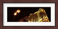Framed Low angle view of a hotel lit up at night, The Strip, Las Vegas, Nevada, USA