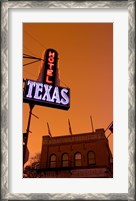 Framed Low angle view of a neon sign of a hotel lit up at dusk, Fort Worth Stockyards, Fort Worth, Texas, USA