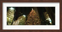 Framed Christmas tree lit up at night, Rockefeller Center, Manhattan, New York State