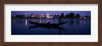 Framed Boat in a lake with city in the background, Lake Merritt, Oakland, Alameda County, California, USA