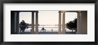 Framed Person stretching near colonnade, Lake Merritt, Oakland, Alameda County, California, USA