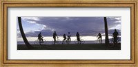 Framed Tourists cycling on the beach, Honolulu, Oahu, Hawaii, USA