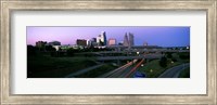 Framed Highway interchange and skyline at sunset, Kansas City, Missouri, USA