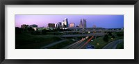 Framed Highway interchange and skyline at sunset, Kansas City, Missouri, USA