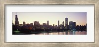 Framed City skyline with Lake Michigan and Lake Shore Drive in foreground at dusk, Chicago, Illinois, USA