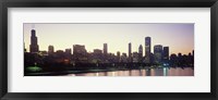 Framed City skyline with Lake Michigan and Lake Shore Drive in foreground at dusk, Chicago, Illinois, USA
