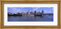 Framed Paul Brown Stadium with John A. Roebling Suspension Bridge along the Ohio River, Cincinnati, Hamilton County, Ohio, USA