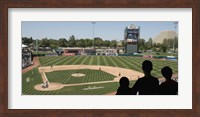 Framed Spectator watching a baseball match at stadium, Raley Field, West Sacramento, Yolo County, California, USA