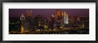 Framed High angle view of buildings lit up at night, Pittsburgh, Pennsylvania, USA