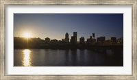 Framed Buildings along the waterfront at sunset, Willamette River, Portland, Oregon, USA