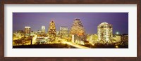 Framed Buildings lit up at dusk, Austin, Texas, USA