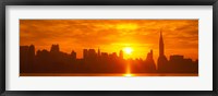 Framed Birght Orange Sky and Sun Behind the New York City Skyline