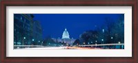Framed Government building lit up at dusk, Capitol Building, Pennsylvania Avenue, Washington DC, USA