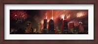 Framed Fireworks over buildings in a city, Houston, Texas