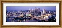 Framed Buildings in a city lit up at dusk, Pittsburgh, Allegheny County, Pennsylvania, USA
