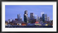 Framed Buildings lit up at dusk, Denver, Colorado