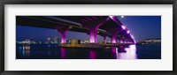 Framed Bridge lit up across a bay, Macarthur Causeway, Biscayne Bay, Miami, Florida, USA