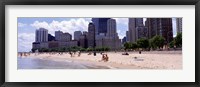 Framed Group of people on the beach, Oak Street Beach, Chicago, Illinois, USA