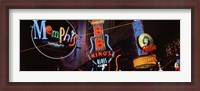 Framed Low angle view of neon signs lit up at night, Beale Street, Memphis, Tennessee, USA