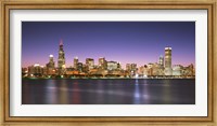 Framed Skyscrapers lit up at night at the waterfront, Lake Michigan, Chicago, Cook County, Illinois, USA