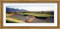 Framed Side profile of a man playing golf at a golf course, Tucson, Arizona, USA