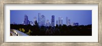 Framed Buildings lit up at dusk, Houston, Texas