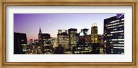 Framed Buildings lit up at dusk, Manhattan