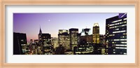 Framed Buildings lit up at dusk, Manhattan