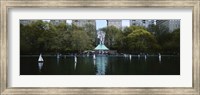 Framed Toy boats floating on water, Central Park, Manhattan