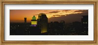 Framed High angle view of buildings lit up at dusk, New Orleans, Louisiana, USA