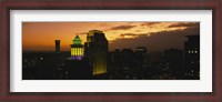 Framed High angle view of buildings lit up at dusk, New Orleans, Louisiana, USA