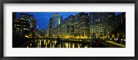 Framed Low angle view of buildings lit up at night, Chicago River, Chicago, Illinois, USA