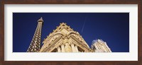 Framed Low angle view of a building in front of a replica of the Eiffel Tower, Paris Hotel, Las Vegas, Nevada, USA