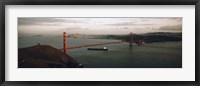 Framed Barge passing under a bridge, Golden Gate Bridge, San Francisco, California, USA