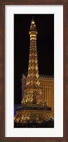 Framed Replica of the Eiffel Tower lit up at night, Paris Las Vegas, Las Vegas, Nevada, USA
