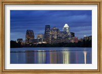 Framed Buildings at the waterfront lit up at dusk, Town Lake, Austin, Texas, USA