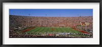 Framed High angle view of a football stadium full of spectators, Los Angeles Memorial Coliseum, City of Los Angeles, California, USA