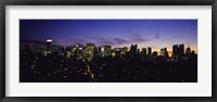 Framed Skyscrapers in a city lit up at night, Manhattan, New York City, New York State, USA