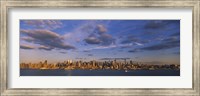 Framed New York Skyline from a Distance with Cloudy Sky