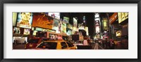 Framed Buildings lit up at night in a city, Broadway, Times Square, Midtown Manhattan, Manhattan, New York City, New York State, USA